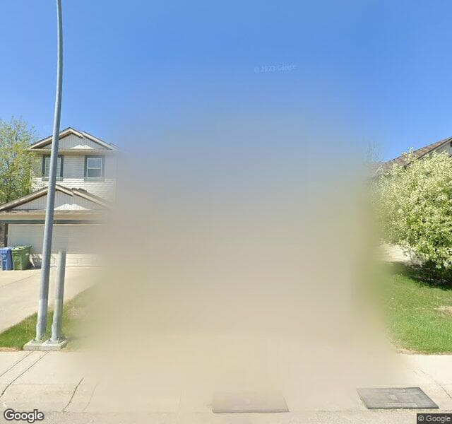 Street view of 261 Panamount Hill NW, Calgary