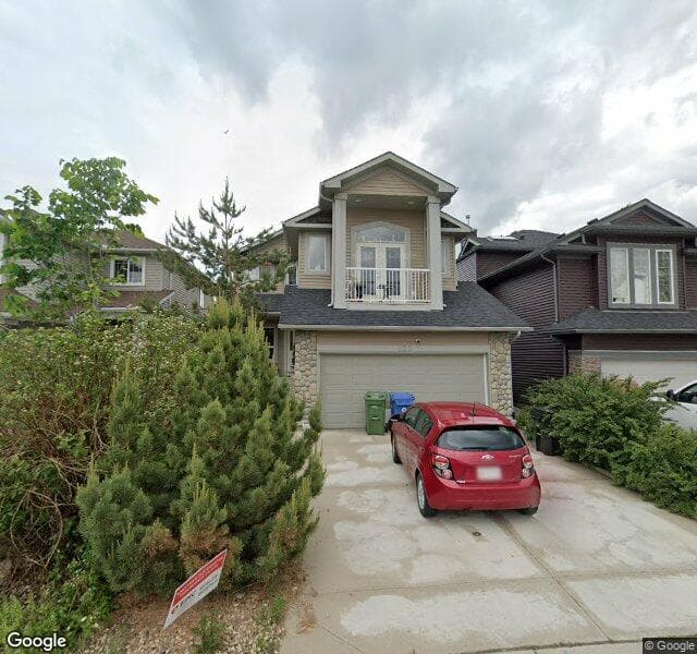 Street view of 303 Bridlemeadows Common SW, Calgary