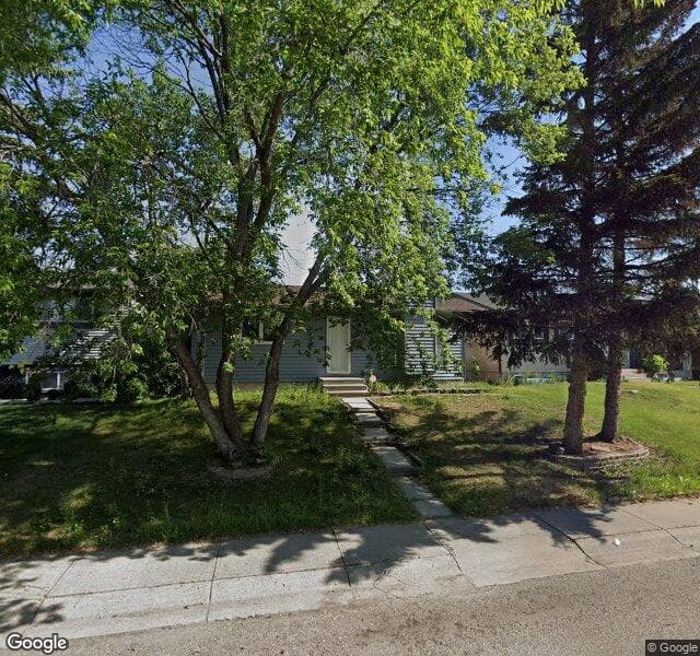 Street view of 875 Pinecliff Drive NE, Calgary
